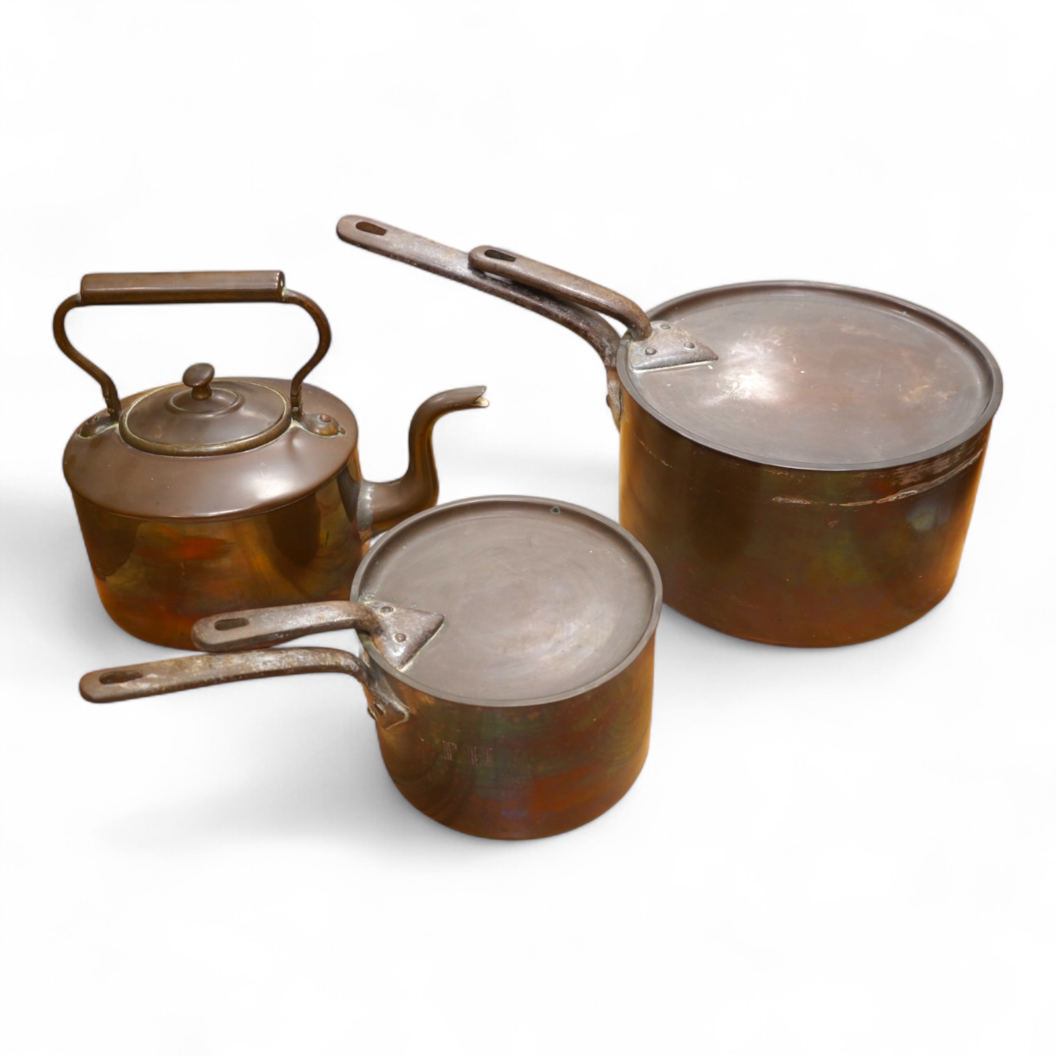 Two Benham & Froud copper saucepans and a copper kettle, largest 43cm in length